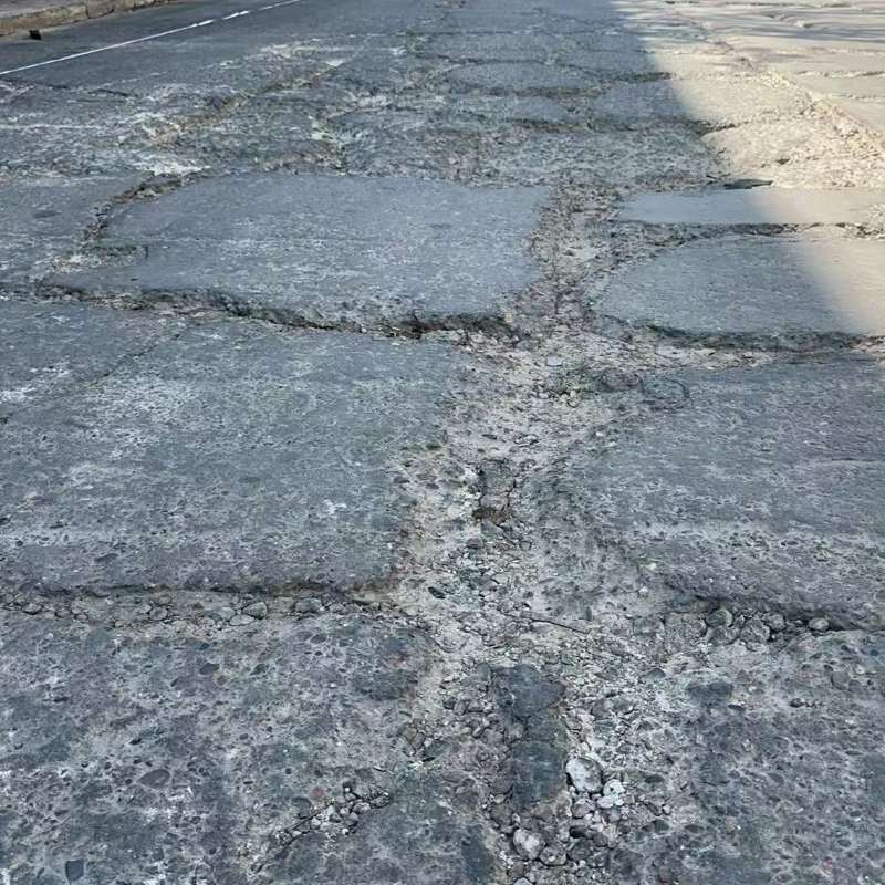 铜鼓路面起砂露石子修补料
